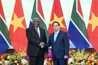 Thủ tướng Chính phủ Phạm Minh Chính và Tổng thống Cộng hòa Nam Phi Cyril Ramaphosa. (Ảnh: TRẦN HẢI) 