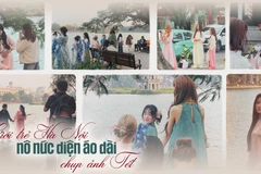 Giới trẻ nô nức diện áo dài xuống phố chụp ảnh đón Tết.