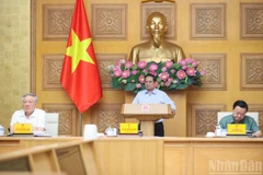 Thủ tướng Phạm Minh Chính chủ trì cuộc họp quán triệt các nhiệm vụ trọng tâm triển khai mô hình tổ chức chính quyền địa phương 2 cấp. (Ảnh: TRẦN HẢI)