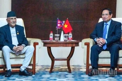 Thủ tướng Phạm Minh Chính và Thủ tướng Nepal Khadga Prasad Sharma Oli. (Ảnh: Nhật Bắc)