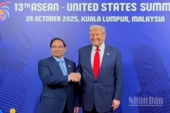 Thủ tướng Chính phủ Phạm Minh Chính và Tổng thống Hoa Kỳ Donald Trump. (Ảnh: Nhật Bắc/VGP)