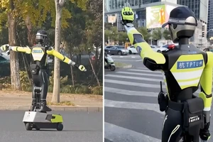 [Video] Người dân Trung Quốc thích thú với robot AI kiểm soát giao thông 