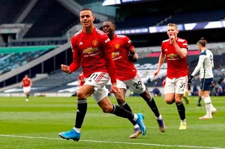 MU ngược dòng đánh bại Tottenham 3-1 đêm chủ nhật, 11-4. (Ảnh: Getty Images)