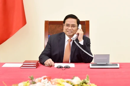  Thủ tướng Phạm Minh Chính điện đàm với Thủ tướng Singapore Lý Hiển Long. (Ảnh: TRẦN HẢI)