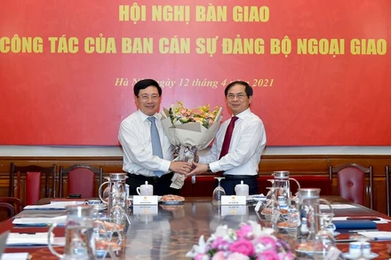 Đồng chí Phạm Bình Minh và đồng chí Bùi Thanh Sơn tại Hội nghị. (Ảnh: Bộ Ngoại giao)