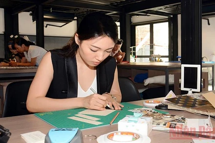 Các bạn trẻ làm việc tại Không gian sáng tạo Creative Labby Up (số 1 Lương Yên, Hai Bà Trưng, Hà Nội). Ảnh: THU HÀ