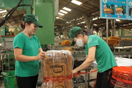 Sản xuất cao su xuất khẩu tại Công ty TNHH MTV cao su Dầu Tiếng. (Ảnh: ANH TUẤN)