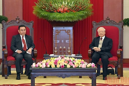 Tổng Bí thư Nguyễn Phú Trọng tiếp Chủ tịch Quốc hội Lào Saysomphone Phomvihane. (Ảnh: Duy Linh)