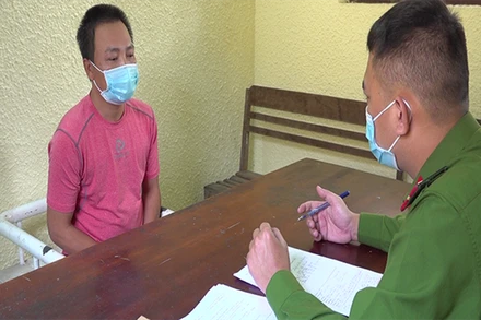 Đối tương Hồ Ngọc Hoan tại cơ quan công an.