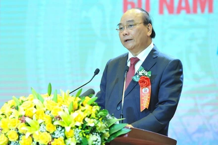 Chủ tịch nước Nguyễn Xuân Phúc phát biểu tại buổi lễ. (Ảnh: Minh Đức/TTXVN)