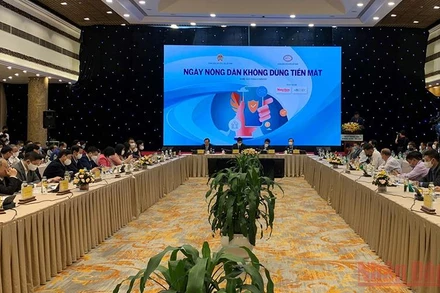 Quang cảnh hội thảo “Ngày nông dân không dùng tiền mặt”.