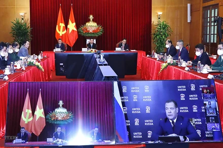 Các đại biểu dự hội nghị trực tuyến tại điểm cầu Hà Nội. (Ảnh: TTXVN)