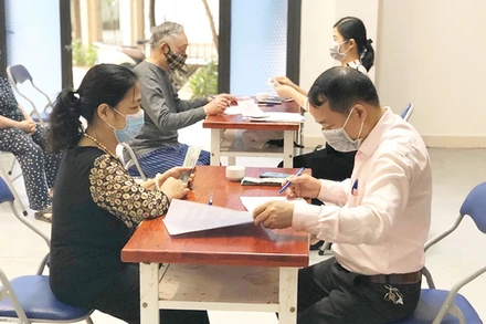 Chi trả hỗ trợ người dân gặp khó khăn do dịch Covid-19.