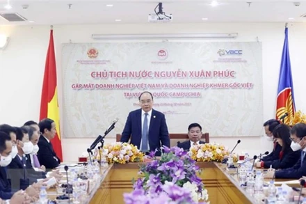 Chủ tịch nước Nguyễn Xuân Phúc phát biểu tại buổi gặp mặt. (Ảnh: TTXVN)