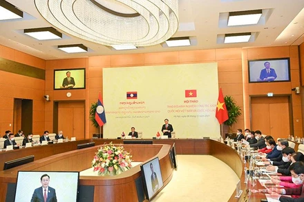 Quang cảnh buổi hội thảo trao đổi kinh nghiệm công tác giữa Quốc hội Việt Nam và Quốc hội Lào. (Ảnh: Duy Linh)