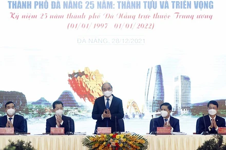 Chủ tịch nước Nguyễn Xuân Phúc dự tọa đàm. (Ảnh: Thống Nhất/TTXVN)