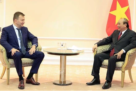 Chủ tịch nước Nguyễn Xuân Phúc tiếp Chủ tịch Tập đoàn Miratorg Victor Linik. (Ảnh: TTXVN)