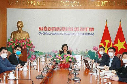 Bà Nguyễn Thị Hoàng Vân, Phó Trưởng Ban Đối ngoại Trung ương tại Hội nghị trực tuyến. (Ảnh: TTXVN) 