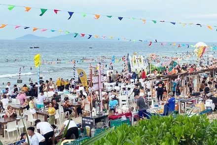 Du khách Việt Nam sẵn sàng cho các chuyến du lịch và cũng hết sức tự tin chào đón du khách nước ngoài (Ảnh minh họa: Lễ hội âm nhạc và ẩm thực biển An Bàng 2022).
