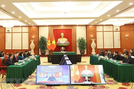 Tổng Bí thư Nguyễn Phú Trọng hội đàm trực tuyến với Chủ tịch Đảng Mặt trận Giải phóng Mozambique (FRELIMO), Tổng thống Mozambique Filipe Jacinto Nyusi. (Ảnh: Trí Dũng/TTXVN)