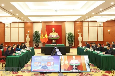 Tổng Bí thư Nguyễn Phú Trọng hội đàm trực tuyến với Chủ tịch Đảng Mặt trận Giải phóng Mozambique (FRELIMO), Tổng thống Mozambique Filipe Jacinto Nyusi. (Ảnh: Trí Dũng/TTXVN)