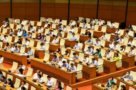 Các đại biểu Quốc hội tham dự phiên chất vấn và trả lời chất vấn tại Kỳ họp thứ ba. (Ảnh: NGUYÊN KHOA)