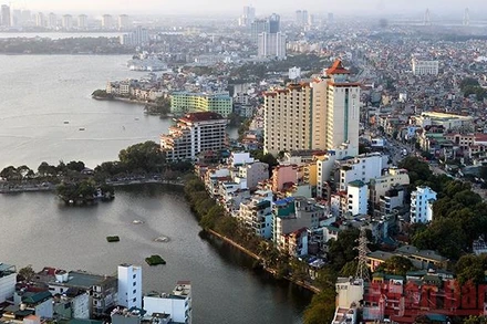 Phát triển công trình xanh sẽ là giải pháp bền vững cho việc giải quyết các vấn đề ô nhiễm môi trường, nâng cao chất lượng cuộc sống người dân đô thị. (Ảnh: Ðăng Khoa)