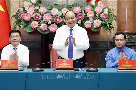 Chủ tịch nước Nguyễn Xuân Phúc tại buổi gặp mặt cán bộ, công nhân lao động ngành Dầu khí. (Ảnh: TTXVN)