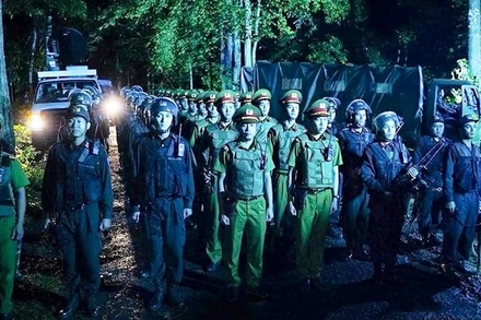 Một cảnh trong phim “Bão ngầm”. (Đoàn làm phim cung cấp)