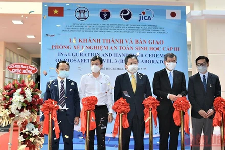 Lễ cắt băng khánh thành phòng thí nghiệm BSL-3 tại Viện Pasteur thành phố Hồ Chí Minh. 