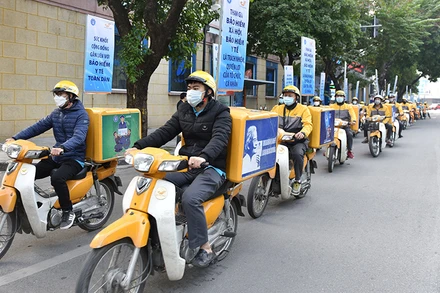 Ra quân vận động người dân tham gia bảo hiểm xã hội tự nguyện tại Hà Nội. (Ảnh: Bảo hiểm xã hội Hà Nội).