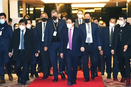 Thủ tướng Phạm Minh Chính đến dự Phiên cấp cao Diễn đàn doanh nghiệp Việt Nam thường niên (VBF). (Ảnh: Trần Hải)