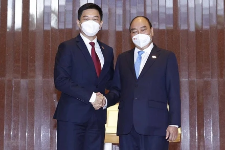 Chủ tịch nước Nguyễn Xuân Phúc hội kiến Chủ tịch Quốc hội Singapore Tan Chuan-Jin. (Ảnh: TTXVN)