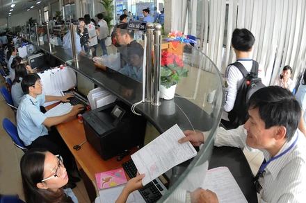 Doanh nghiệp ở TP Hồ Chí Minh làm thủ tục xuất khẩu hàng hóa tại Cảng Cát Lái