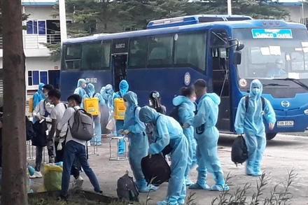 Công dân Việt Nam trở về từ Thái Lan tại khu cách ly tập trung Trường cao đẳng Cảnh sát nhân dân II.