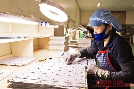 Công ty TNHH sản xuất điện tử PCB Cát Tường (Bắc Ninh) quay lại sản xuất sau đại dịch Covid-19 (Ảnh: THÁI SƠN).