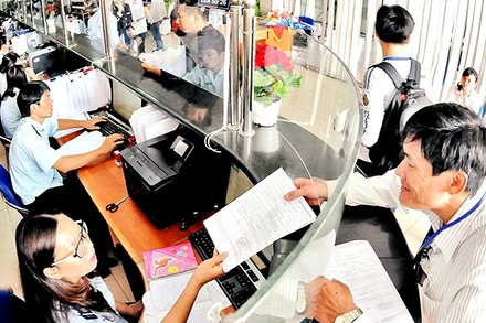 Doanh nghiệp làm thủ tục thông quan hàng hóa tại cảng Cát Lái, TP Hồ Chí Minh (Ảnh minh họa: Hoàng Liêm).