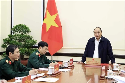 Đồng chí Nguyễn Xuân Phúc, Ủy viên Bộ Chính trị, Chủ tịch nước, Trưởng Ban Chỉ đạo xây dựng Đề án phát biểu. (Ảnh: Thống Nhất/TTXVN)