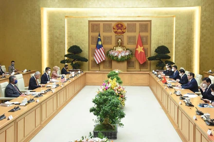 Quang cảnh cuộc hội đàm giữa Thủ tướng Chính phủ Phạm Minh Chính và Thủ tướng Malaysia Dato’ Sri Ismail Sabri bin Yaakob. (Ảnh: TRẦN HẢI)