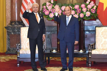 Chủ tịch nước Nguyễn Xuân Phúc tiếp Thủ tướng Malaysia Ismail Sabri Yaakob thăm chính thức Việt Nam. (Ảnh: TRẦN HẢI)