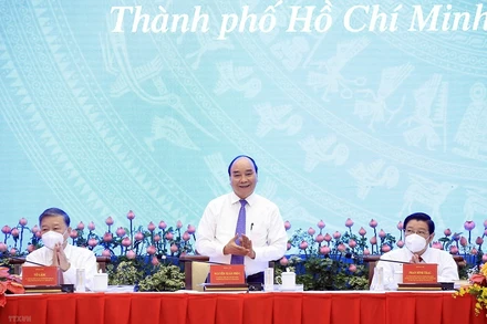 Chủ tịch nước Nguyễn Xuân Phúc chủ trì Hội thảo quốc gia lần thứ ba về xây dựng và hoàn thiện Nhà nước pháp quyền xã hội chủ nghĩa. (Ảnh: TTXVN)