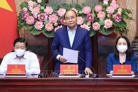 Chủ tịch nước Nguyễn Xuân Phúc phát biểu tại cuộc họp. (Ảnh: Thống Nhất/TTXVN)