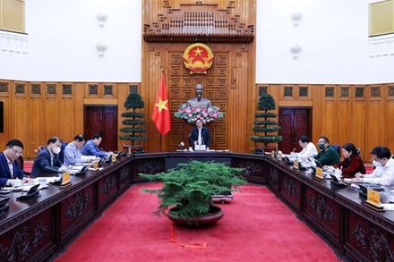 Thủ tướng Phạm Minh Chính chủ trì cuộc làm việc với PVN. (Ảnh: VGP/Nhật Bắc)