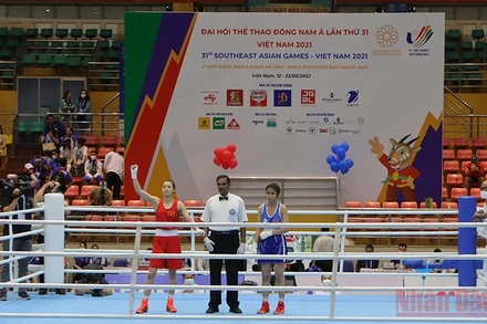 Vận động viên Nguyễn Thị Tâm của Việt Nam xuất sắc chiến thắng knock-out đối thủ. 