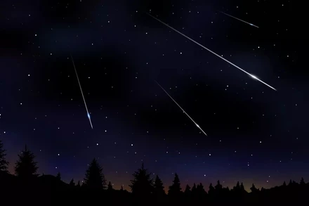 Mưa sao băng Tau Herculid có thể xuất hiện vào đêm 30-31/5. Hình minh họa về một trận mưa sao băng của Olga Beliaeva/Getty Images.