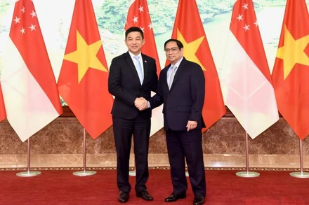 Thủ tướng Chính phủ Phạm Minh Chính tiếp Chủ tịch Quốc hội Singapore Tan Chuan-Jin đang thăm chính thức Việt Nam. (Ảnh: TRẦN HẢI)