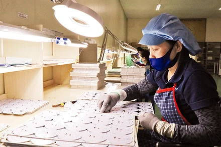 Lao động tại khu công nghiệp ở Bắc Ninh (Ảnh: Thái Sơn).