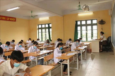Thí sinh dự thi tốt nghiệp trung học phổ thông năm 2021. Ảnh: Đinh Tuấn/TTXVN