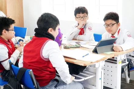 Học sinh Trường THCS Ngoại ngữ trong giờ học. Ảnh: UMS