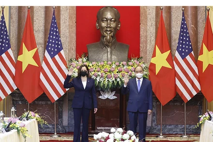 Chủ tịch nước Nguyễn Xuân Phúc và Phó Tổng thống Hoa Kỳ Kamala Harris tại buổi tiếp. (Ảnh: TTXVN)